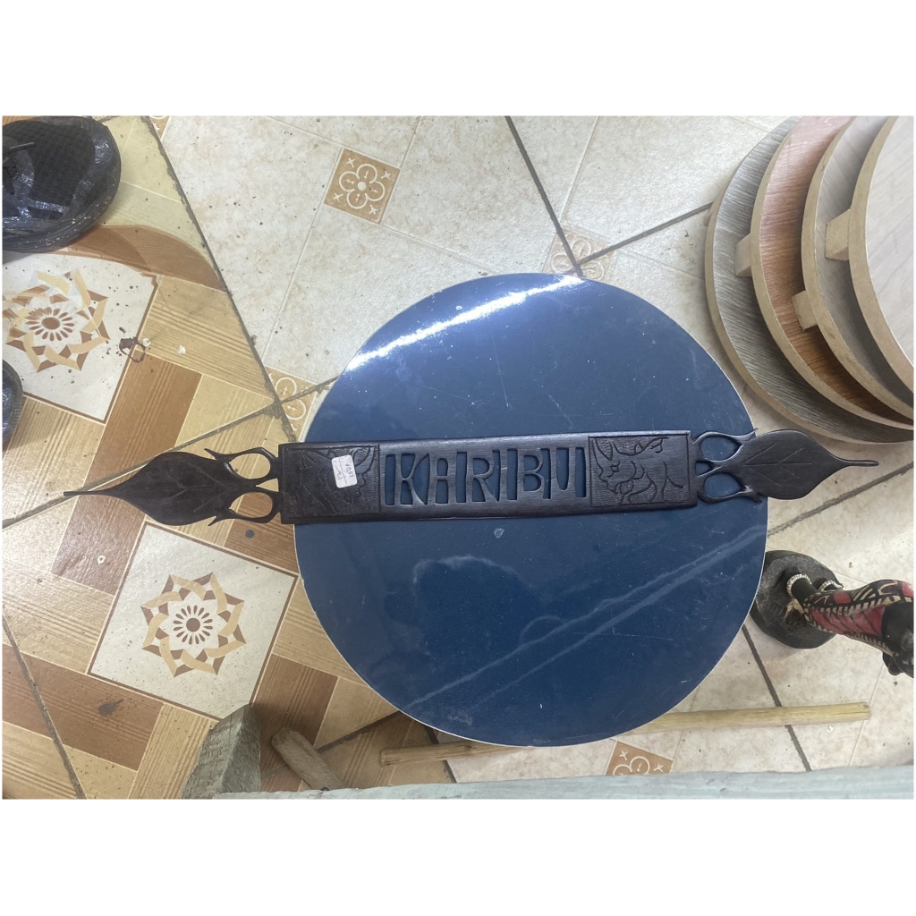 black caribu wall sign