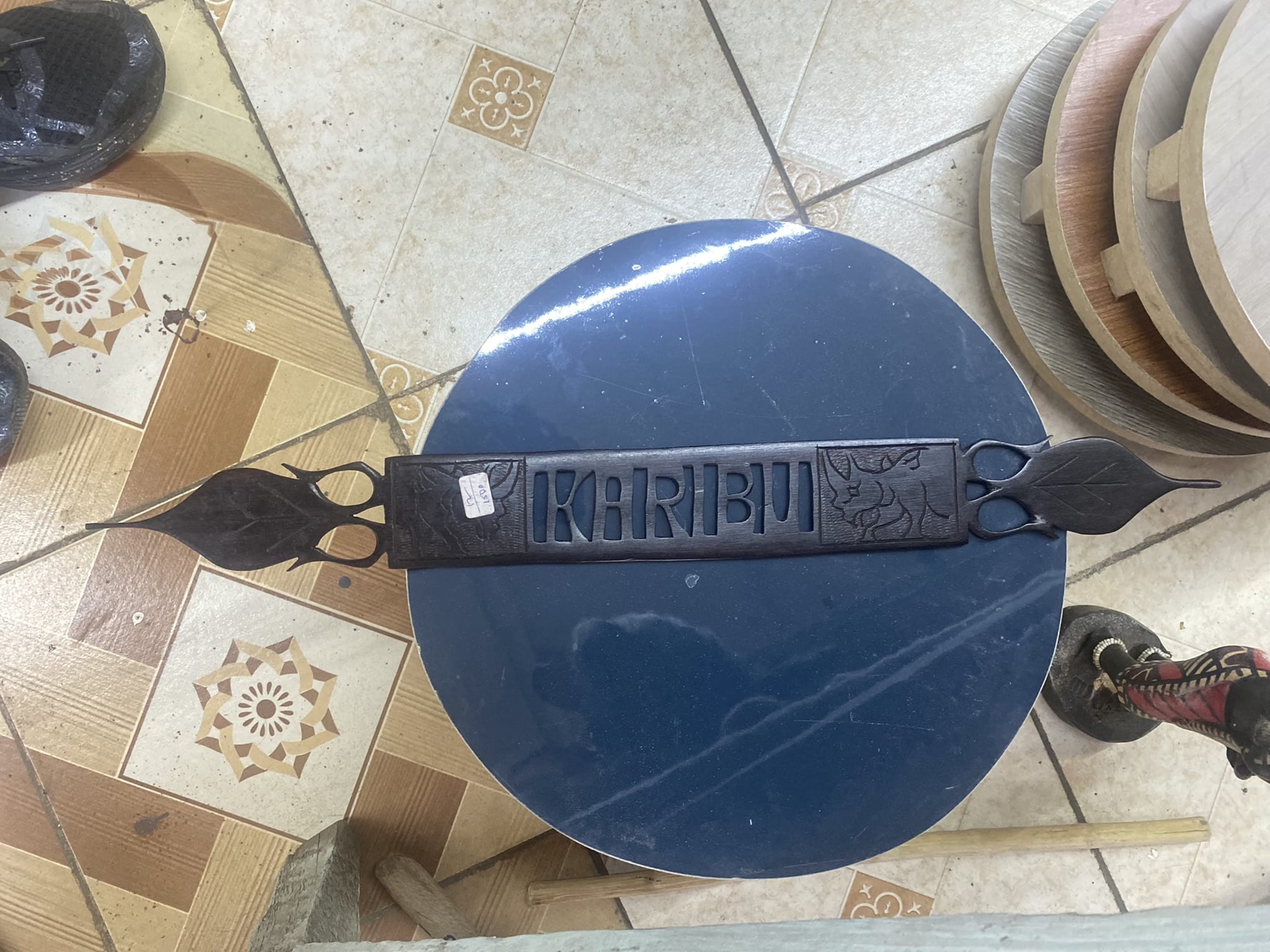 black caribu wall sign
