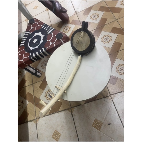 wooden 3 string musical instrument