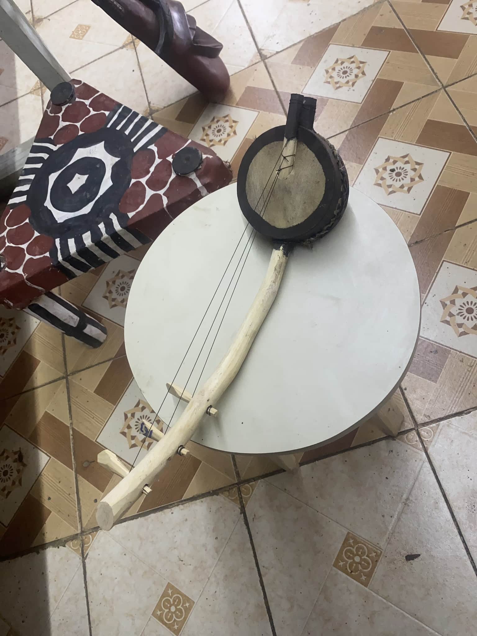 wooden 3 string musical instrument