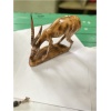 wooden addax grazing