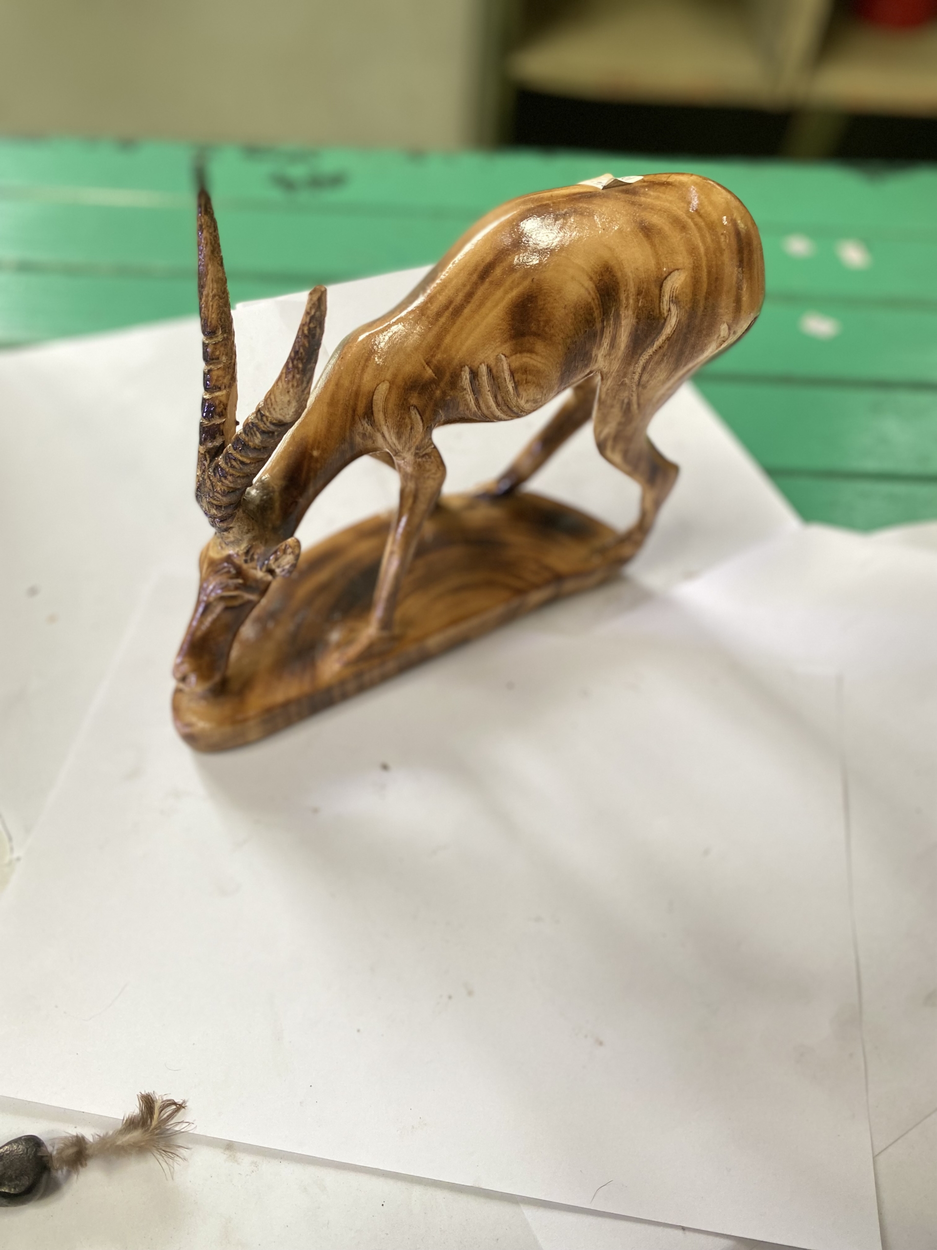 wooden addax grazing