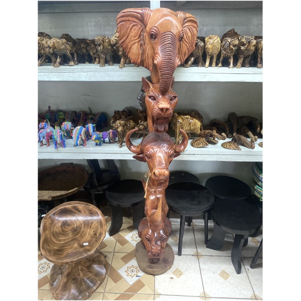 wooden animal totem pole