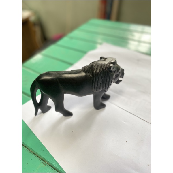 wooden black lion