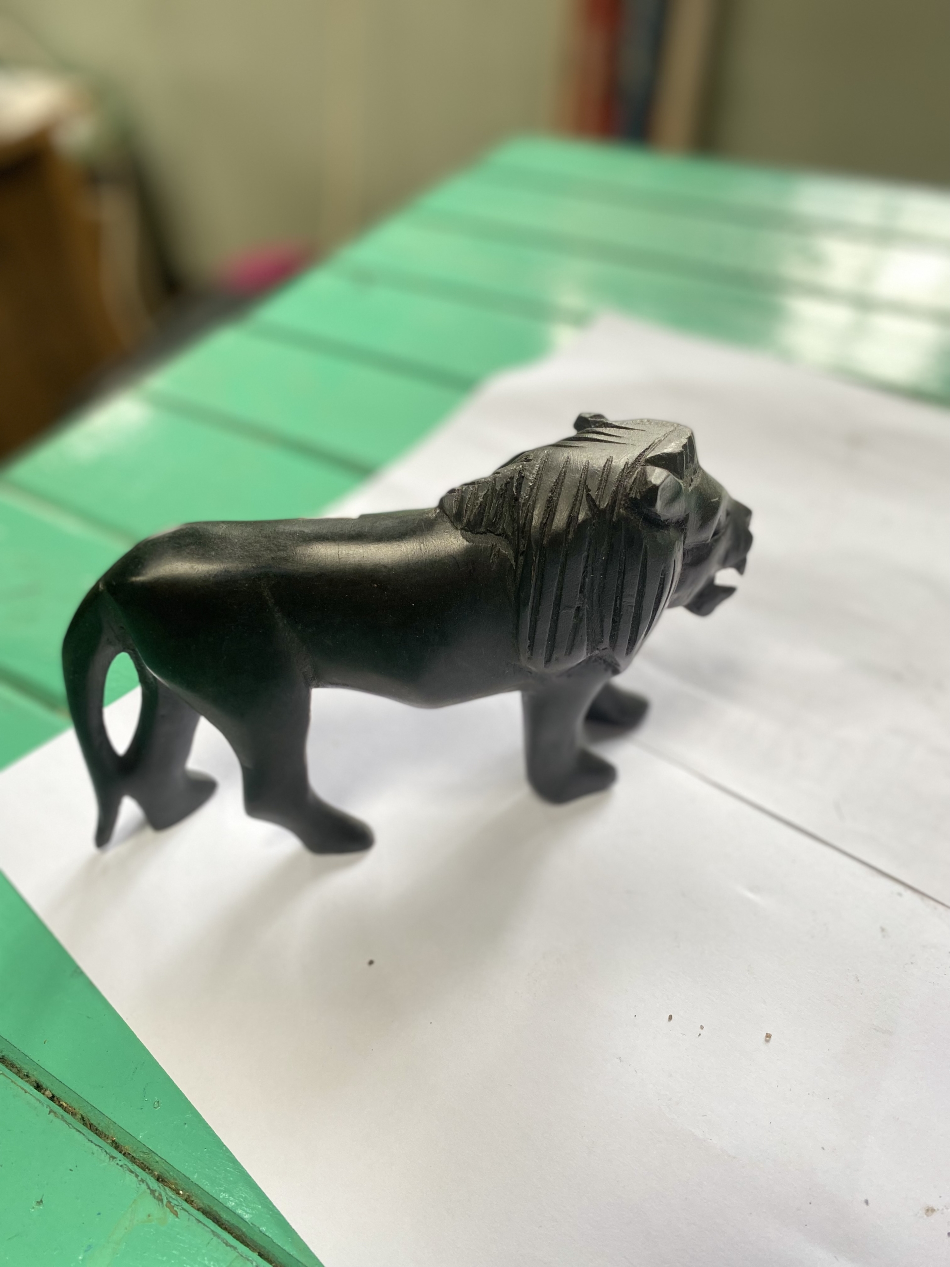 wooden black lion
