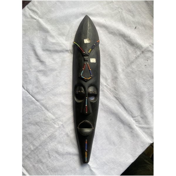 wooden black wall mask
