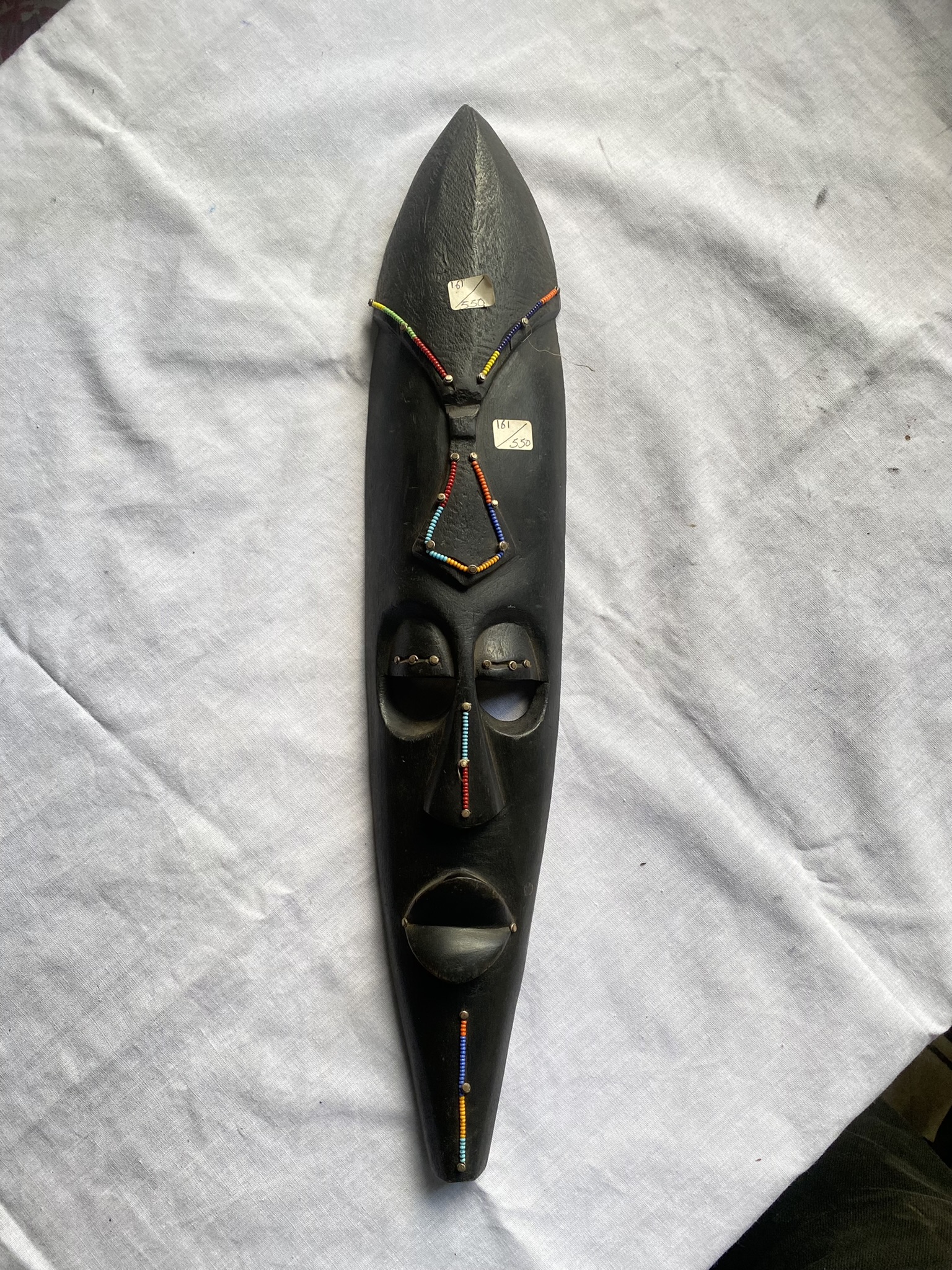 wooden black wall mask