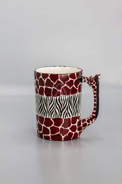 wooden cup with zebra and giraff patern