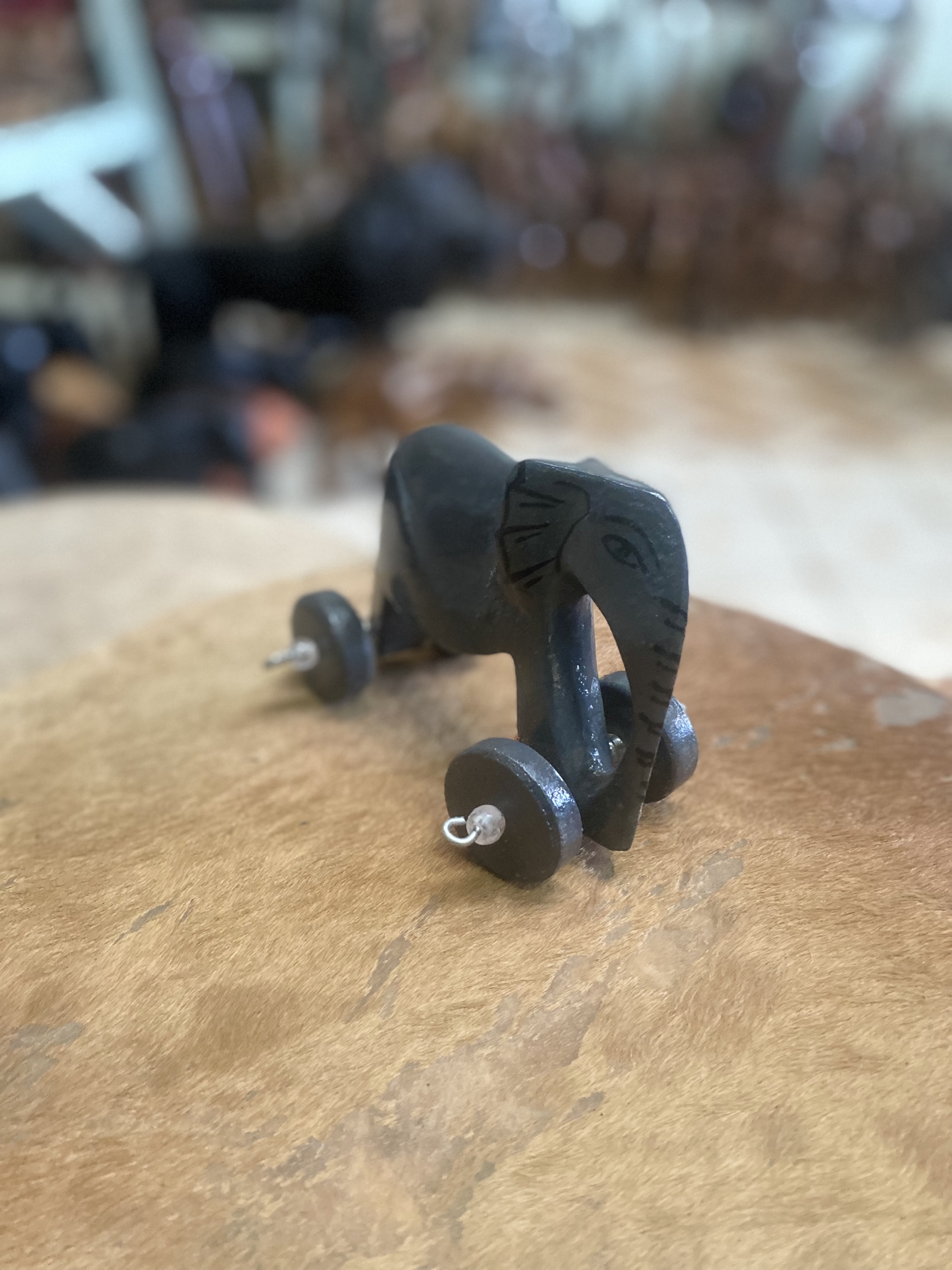 wooden elephant on wheels