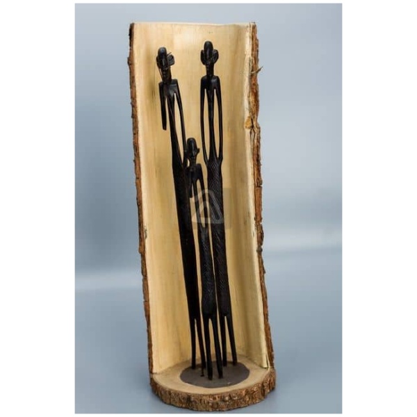 wooden family carved into tree trunk
