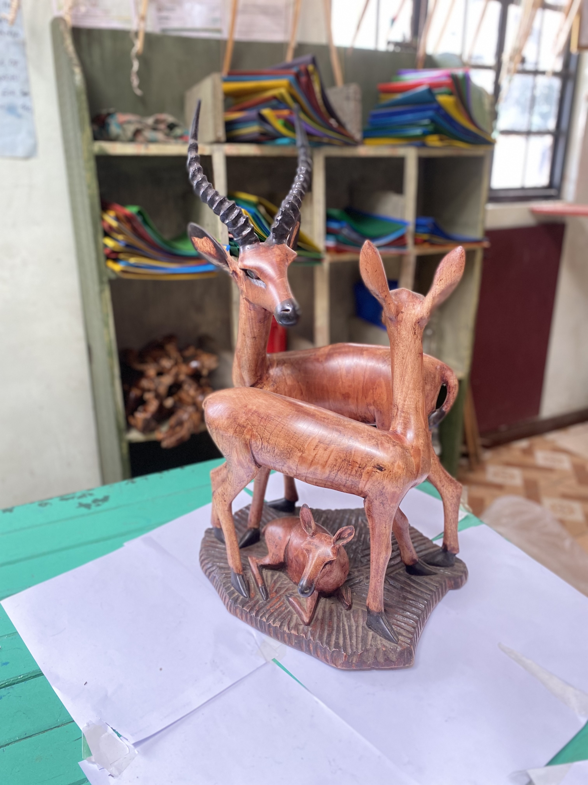 wooden gazelles with fawn