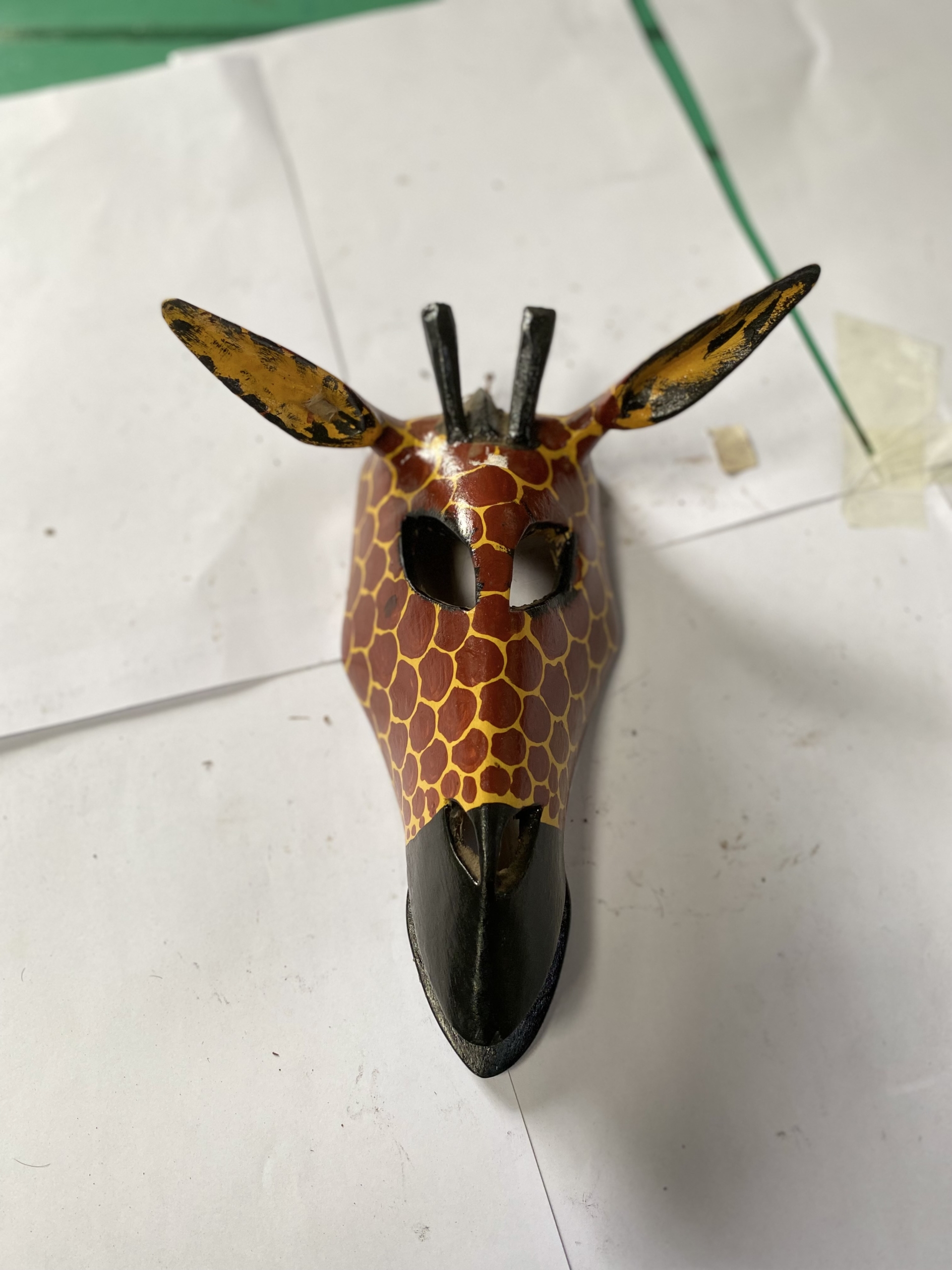 wooden giraffe head mask