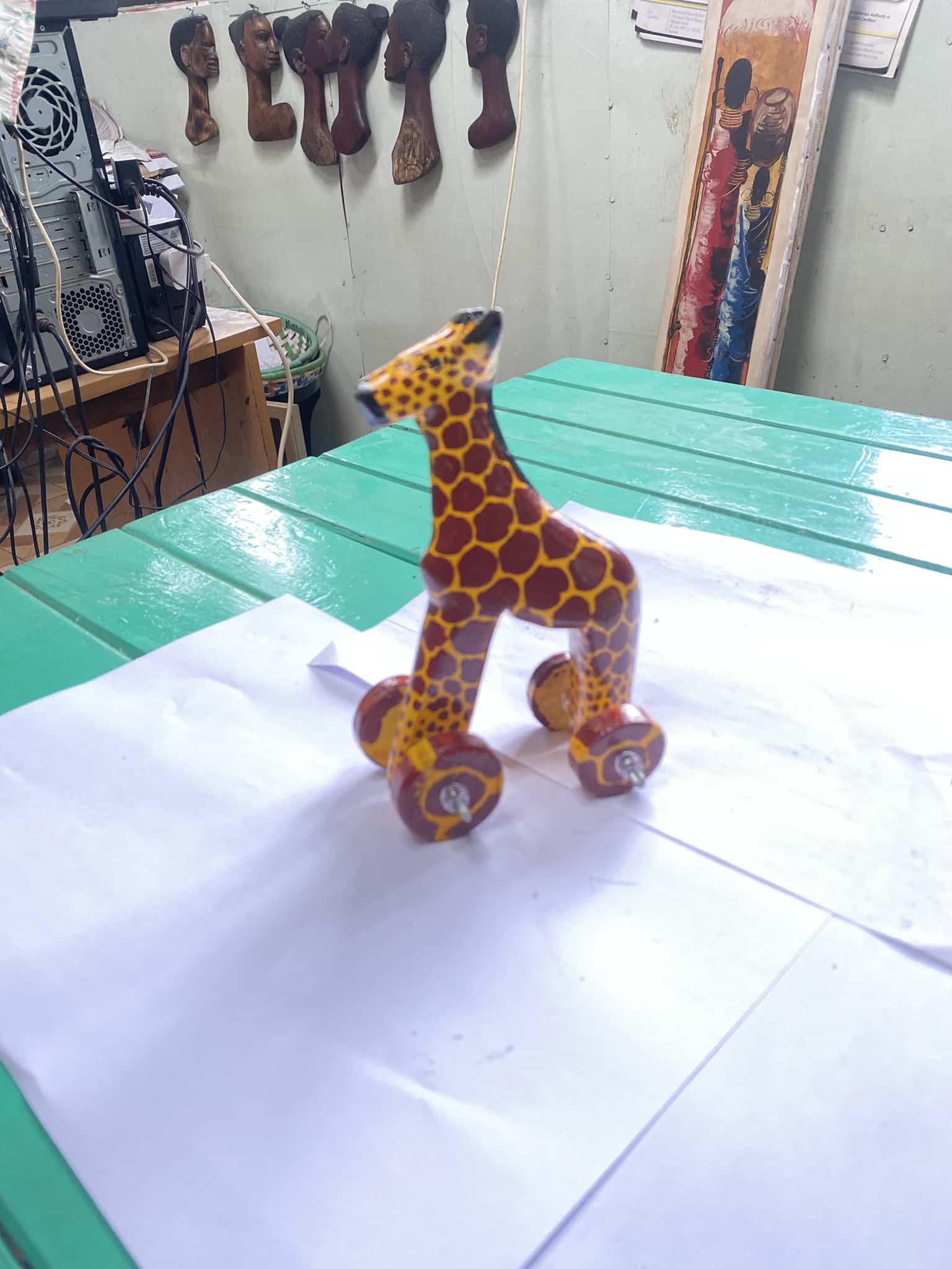 wooden giraffe on wheels 2