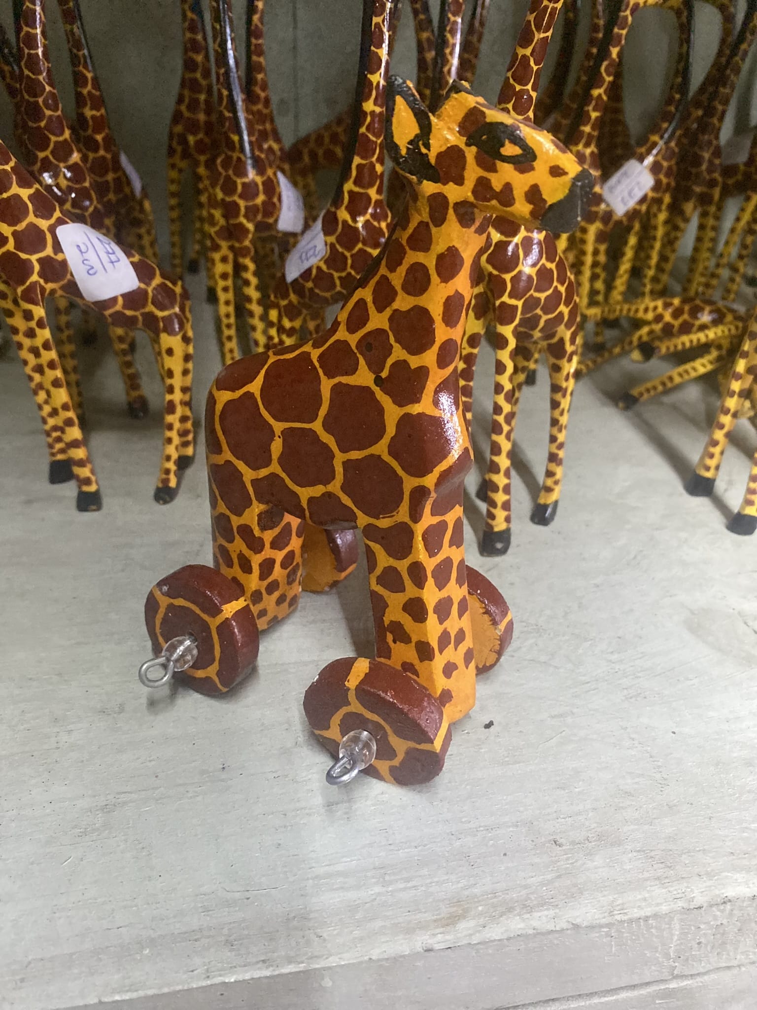 wooden giraffe on wheels 4