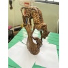 wooden leopard with pray on tree