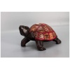 wooden tortoise with animal patterns