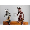 wooden zebra and giraff reading books 2